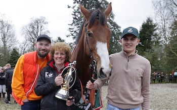 Corach Rambler with his owners and trainer