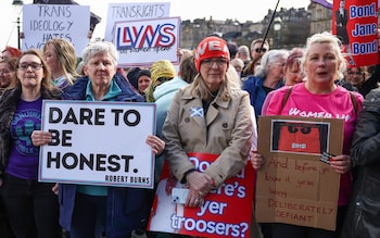 Members of the public take part in a Let Women Speak protest in Edinburgh, Scotland