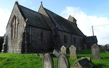 Campaigners have won their fight to stop the sale of an historic church where one of Britain's most famous hymn writers is buried